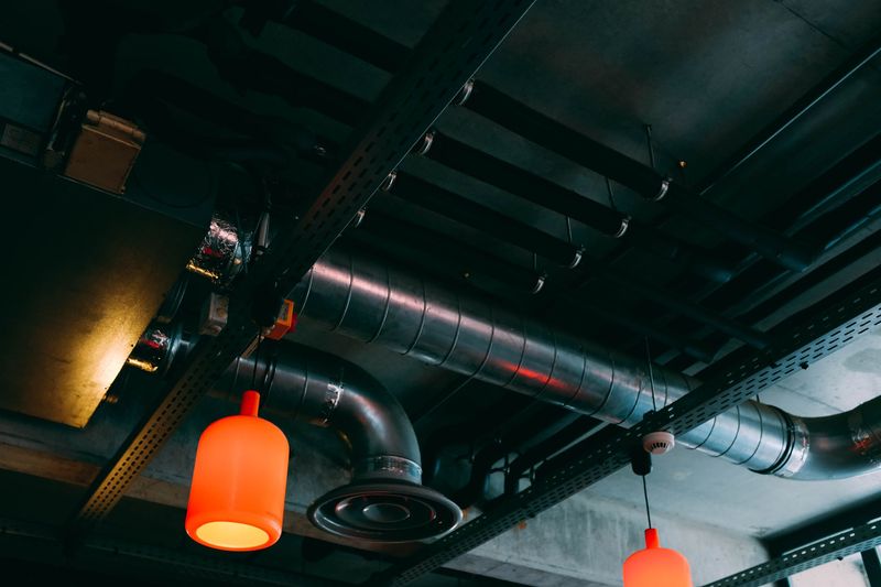 Clean residential mechanical room with heating equipment
